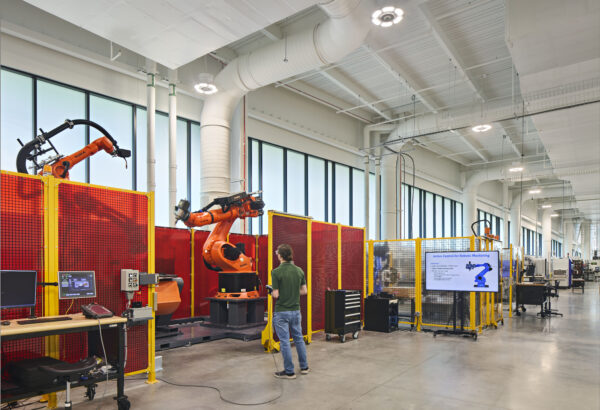 Interior of the Missouri Protoplex advanced manufacturing lab with robotic equipment, safety enclosures, and flexible research work areas.